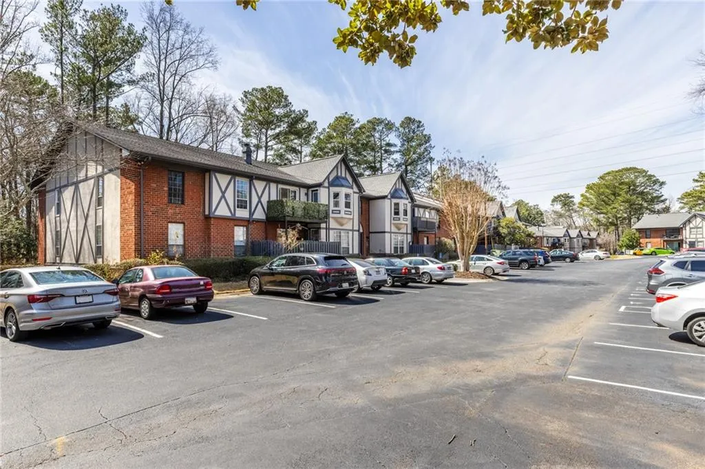 Uncovered parking lot with a residential view