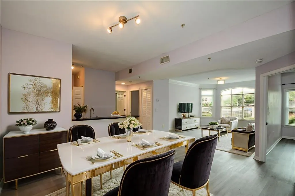 Dining area with wood finished floors and baseboards