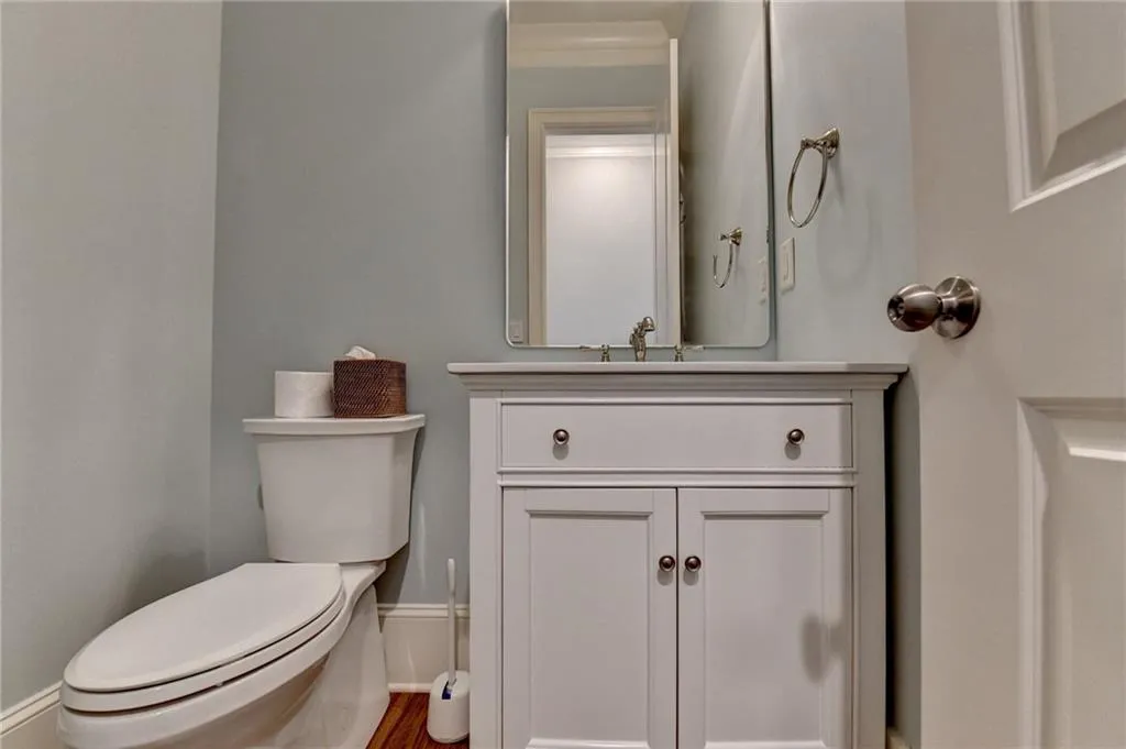 Powder Bath on Main. New toilet and inset shelves