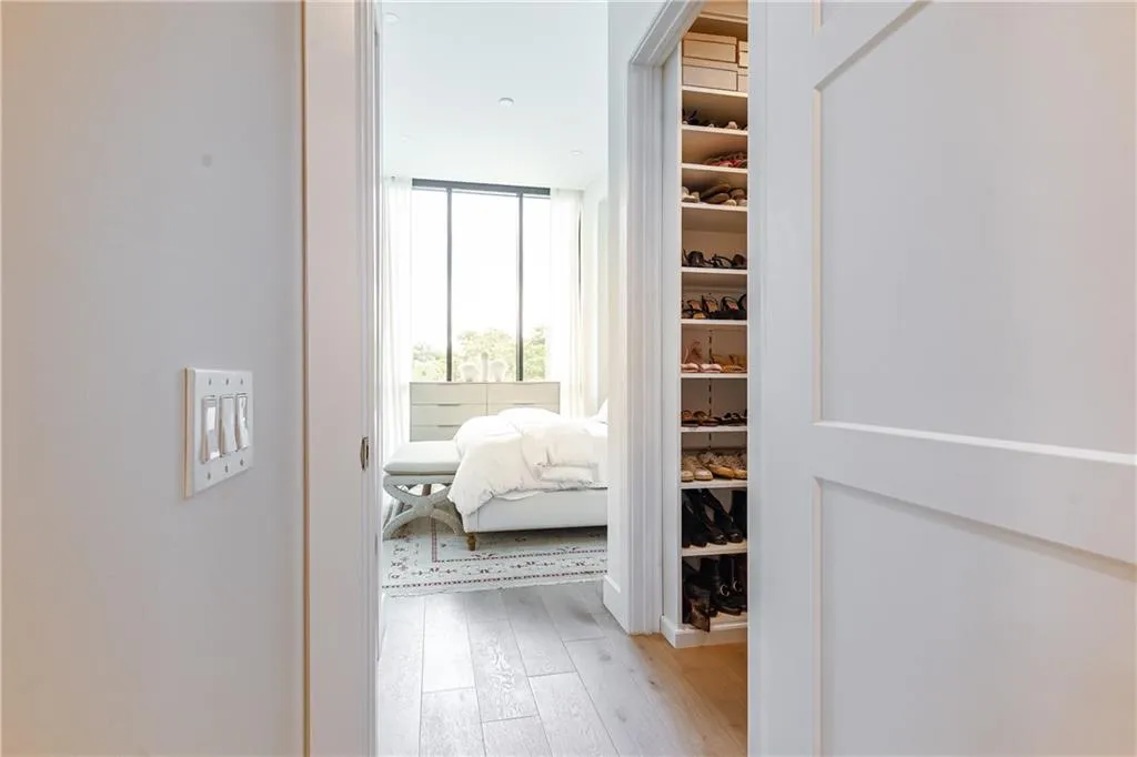 His and hers closets are complete with built in shelving added by the sellers.