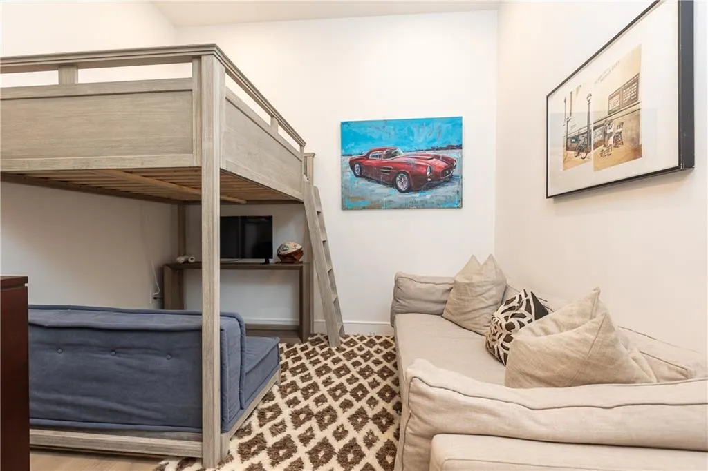 The sellers use this bonus space as a bedroom and gameroom.