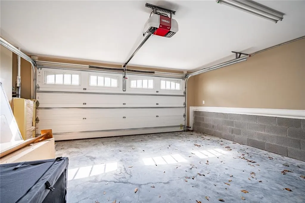 2 car garage with extra storage room
