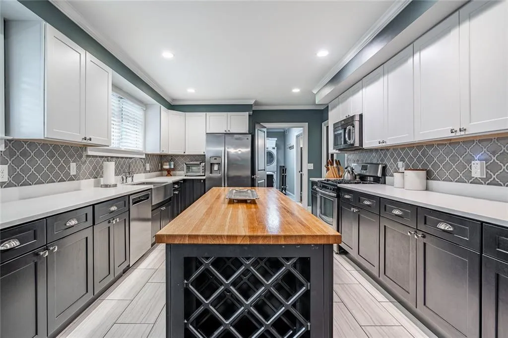 Custom island  has lots of storage and space for your favorite wines