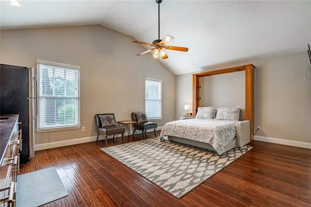 Bedroom 4 in the carriage house has a murphy bed