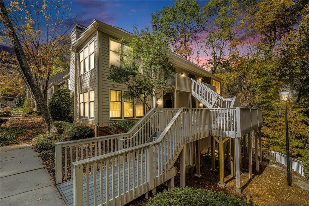 Back house at dusk with a deck