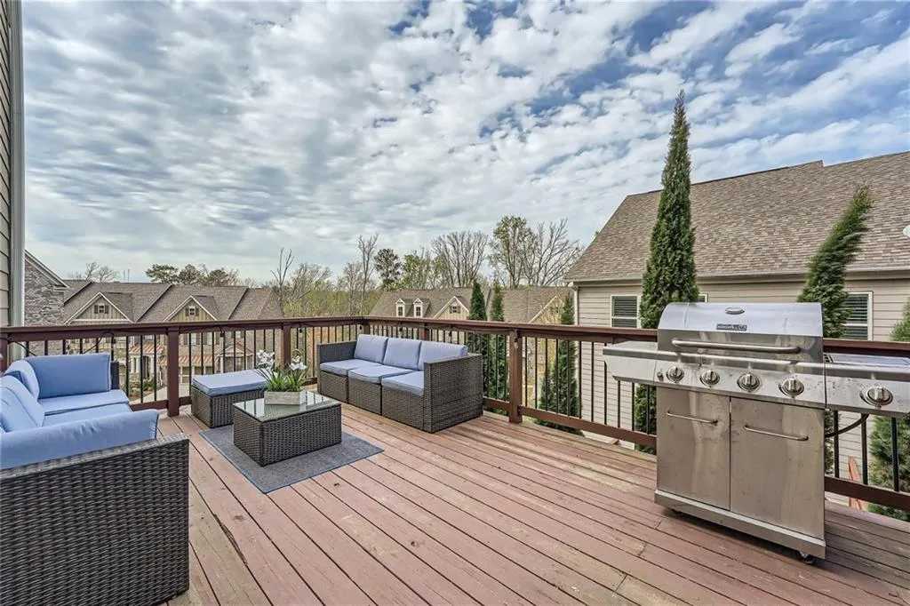 Main Level deck featuring outdoor lounge area