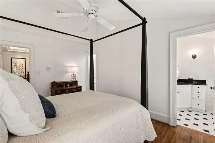 Secondary bedroom with large walk-in closet and ensuite bath.
