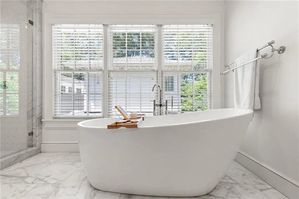 Soaking tub with natural light streaming in