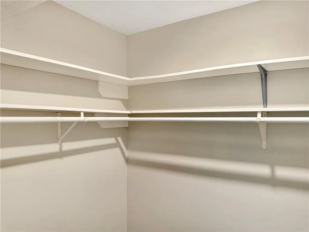 Walk-in closet in bedroom