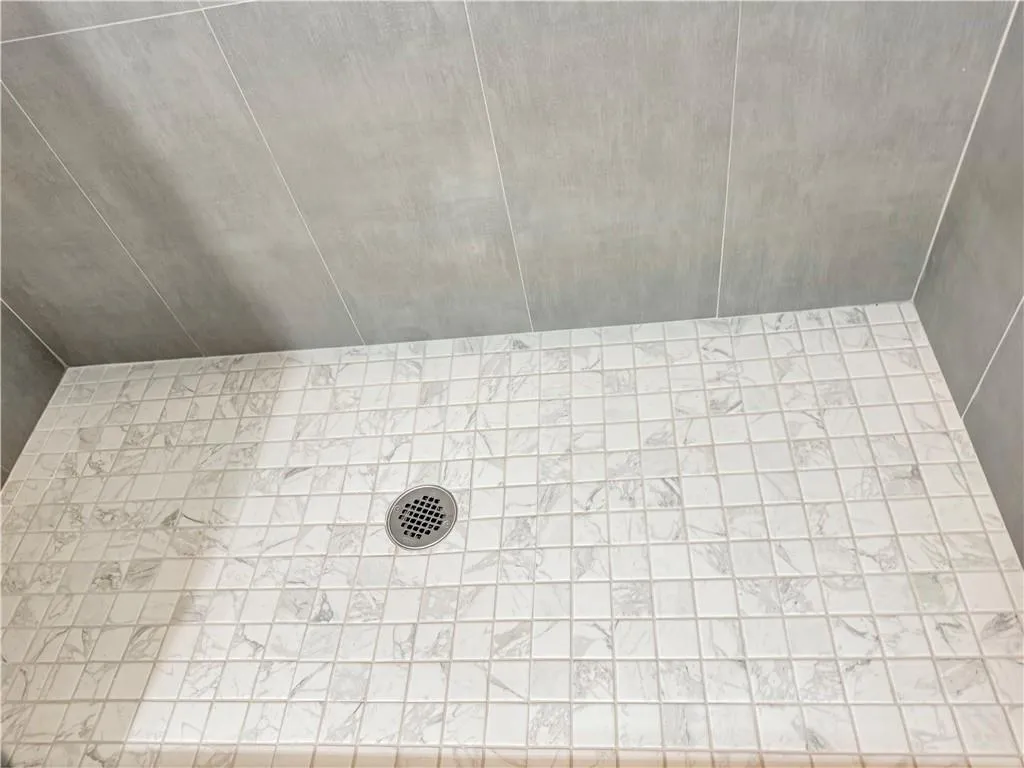 Gorgeous custom tile shower floor