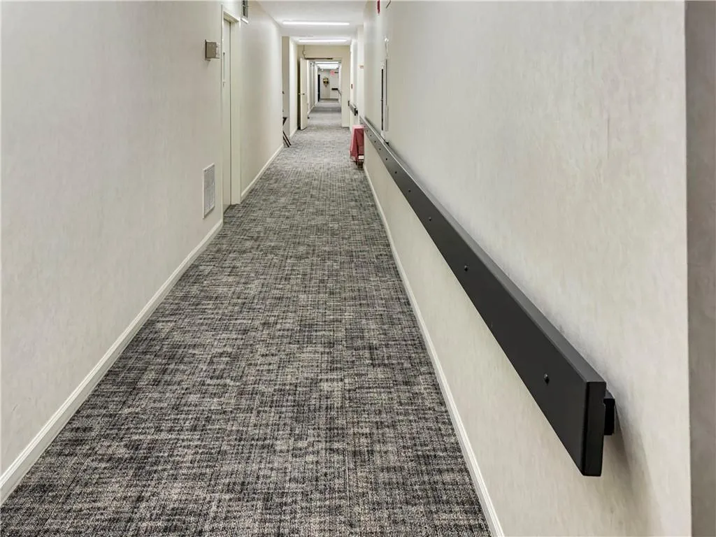 New flooring in hallway to condo
