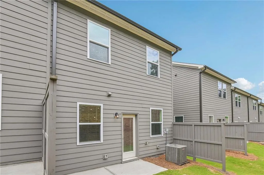 Back of property with a patio area