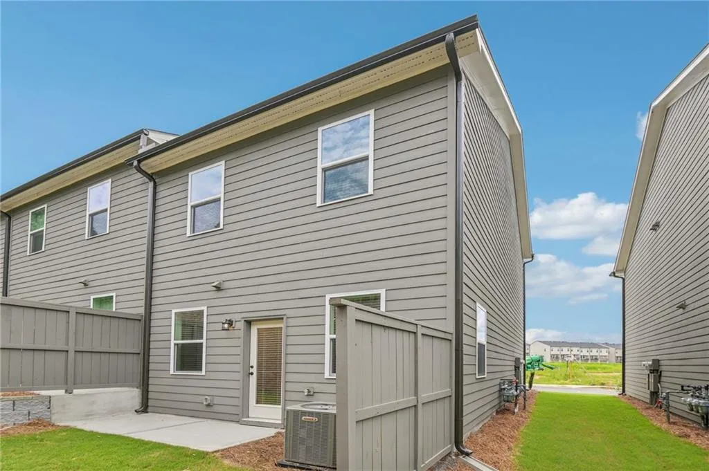 Back of property featuring a patio