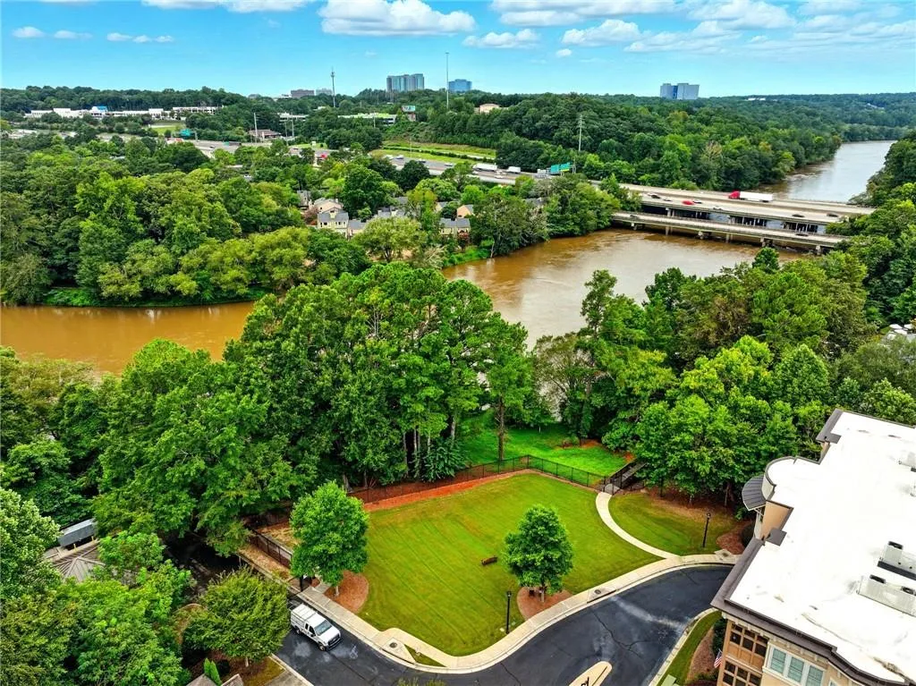 Drone / aerial view of a large body of water and a notable bridge