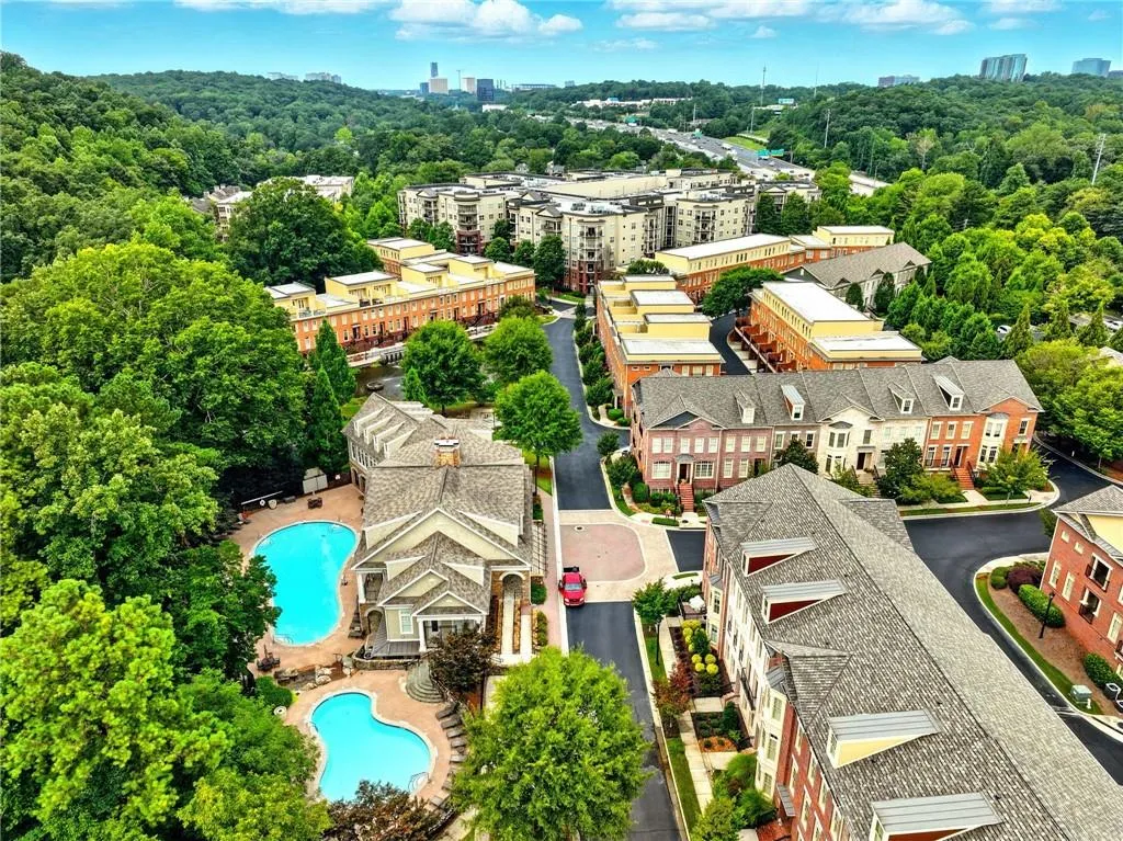 View of urban area featuring a forest