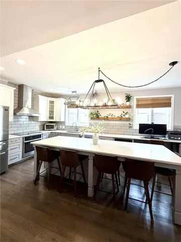Expansive kitchen island with a light-toned countertop
