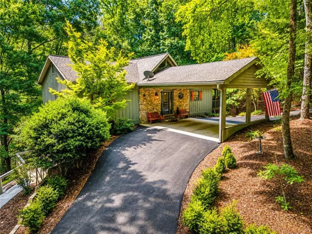 Portico concrete pad and asphalt U-driveway
