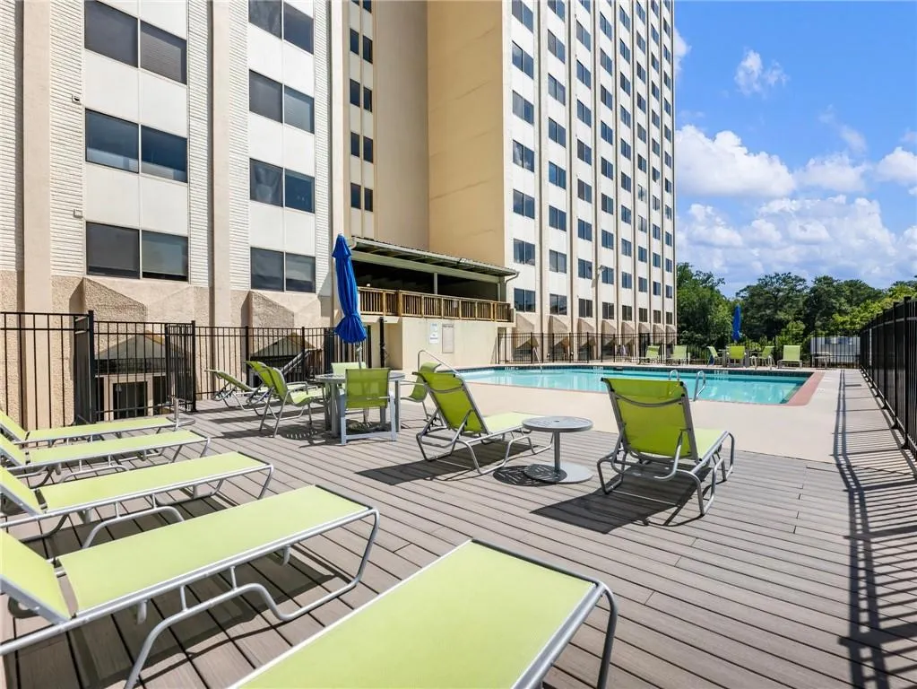 Beautiful Greenery in Late Summer! Loungers, Tables, Umbrellas & Chairs located in the gated Pool area