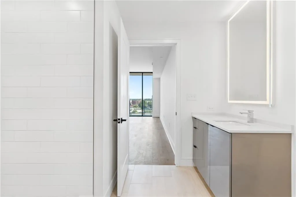 Bathroom with vanity and wood finished floors
