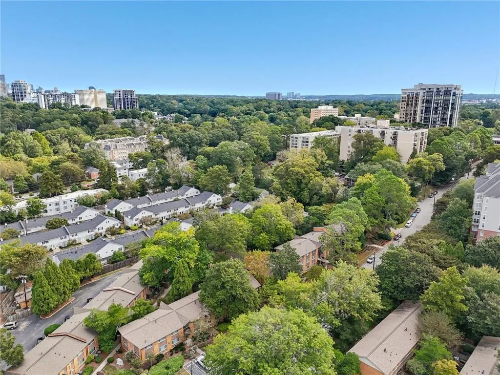 View of urban area with a tree filled landscape