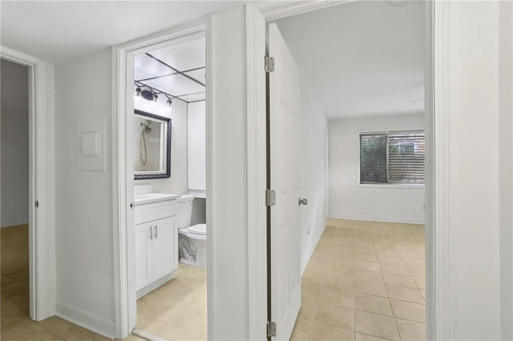 Bathroom featuring vanity and light tile patterned floors