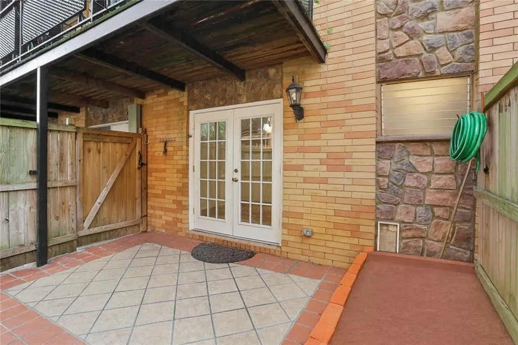 View of patio / terrace with french doors and baseboard heating