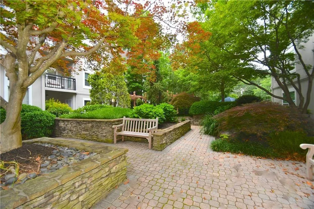 Surrounding community with a patio area