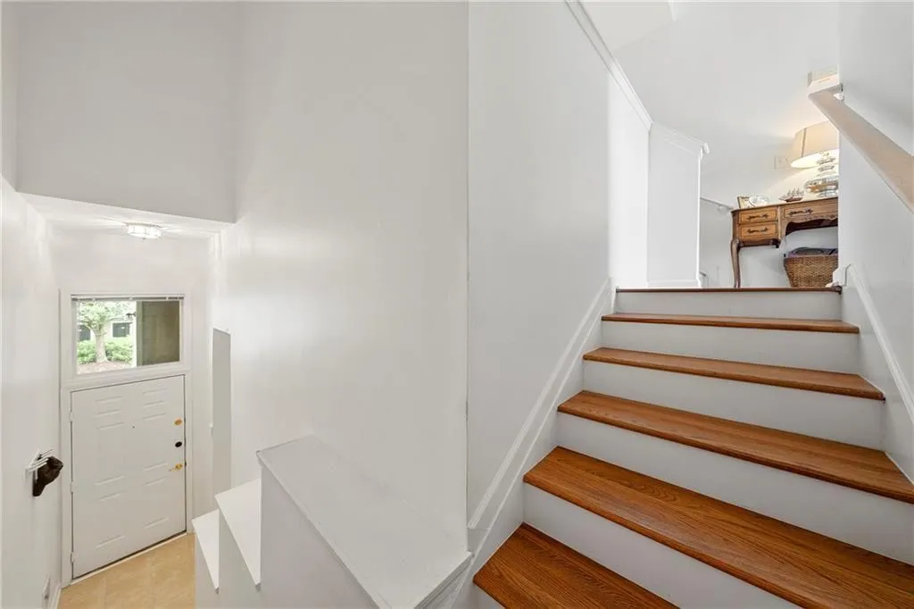 Stairs with tile patterned flooring