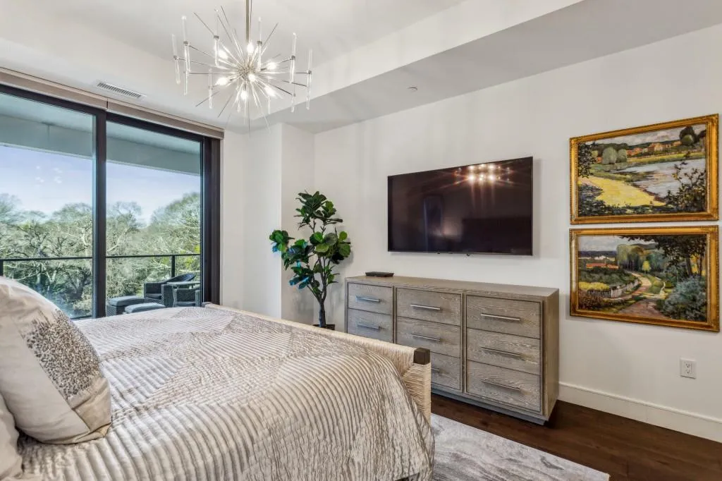 Primary Bedroom...gleaming hardwood floors throughout.