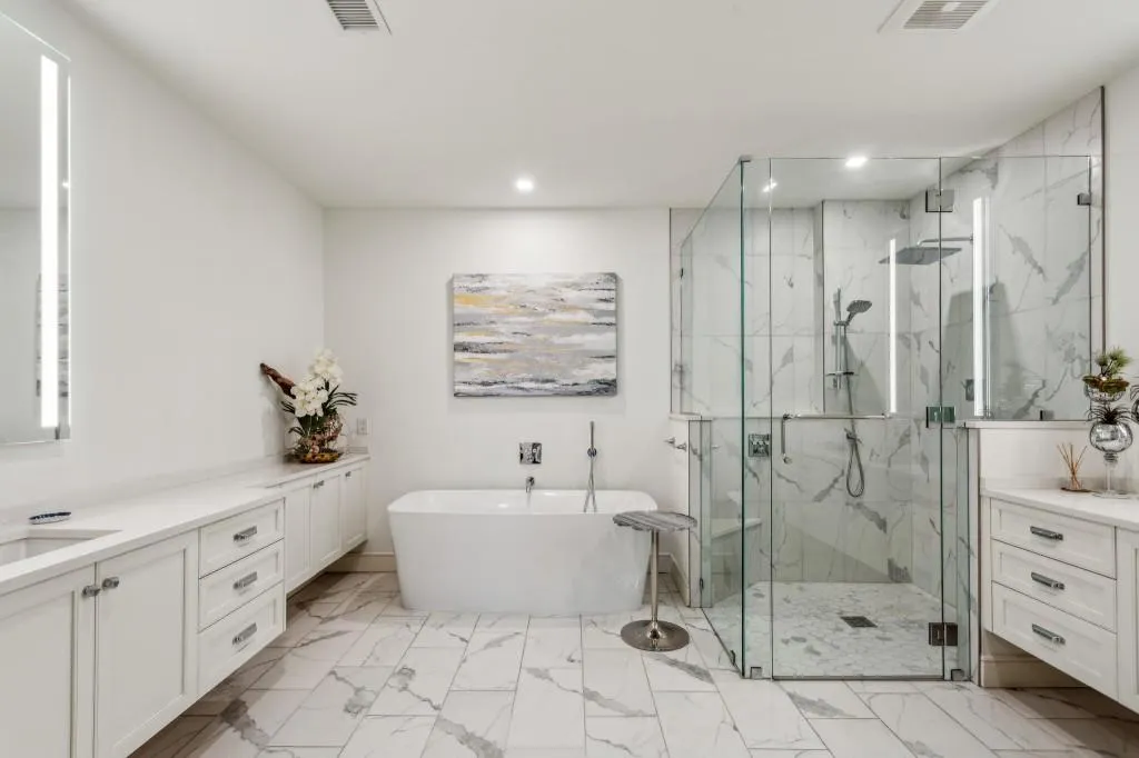 Spa bath with double vanities.