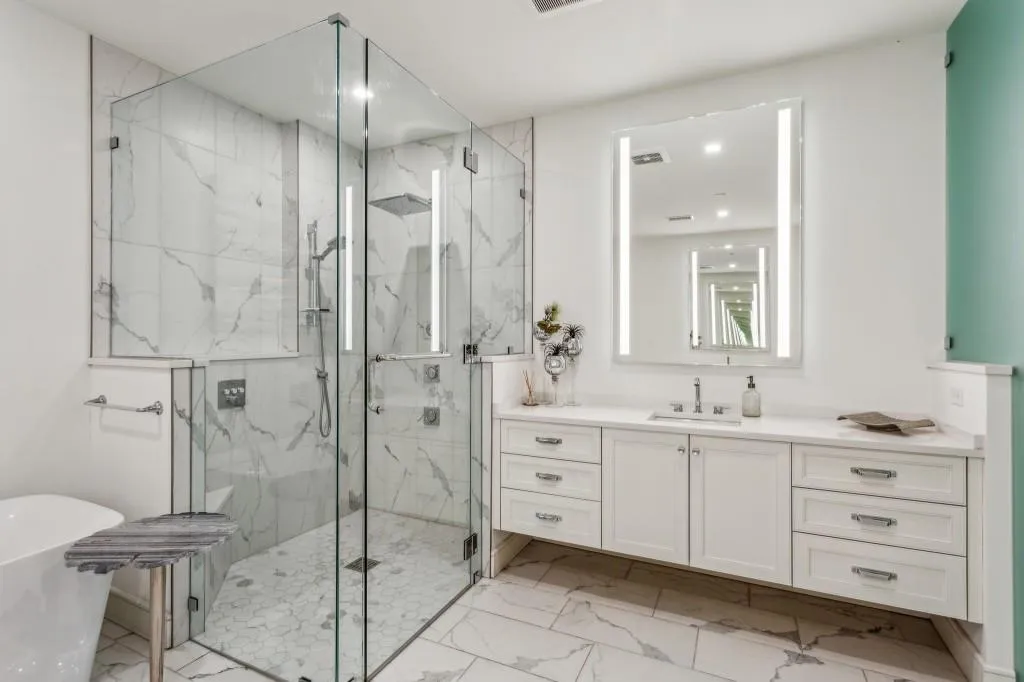 Seamless walk in shower in the primary bath.