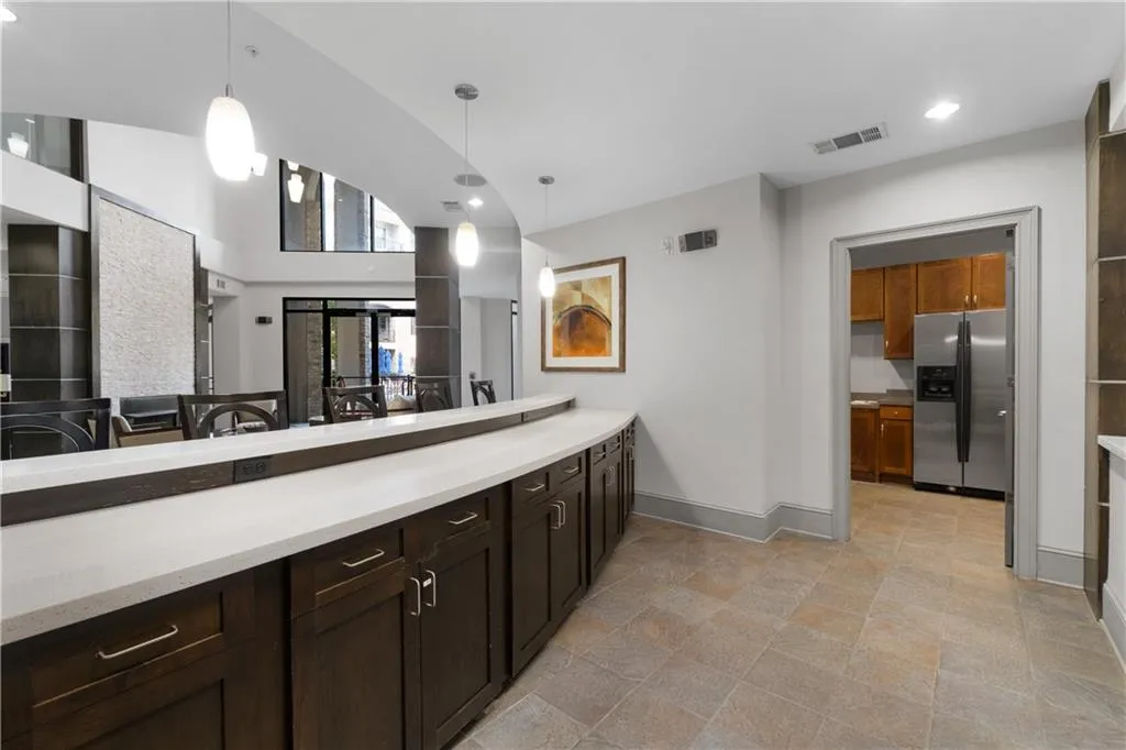 Bathroom with vanity and recessed lighting