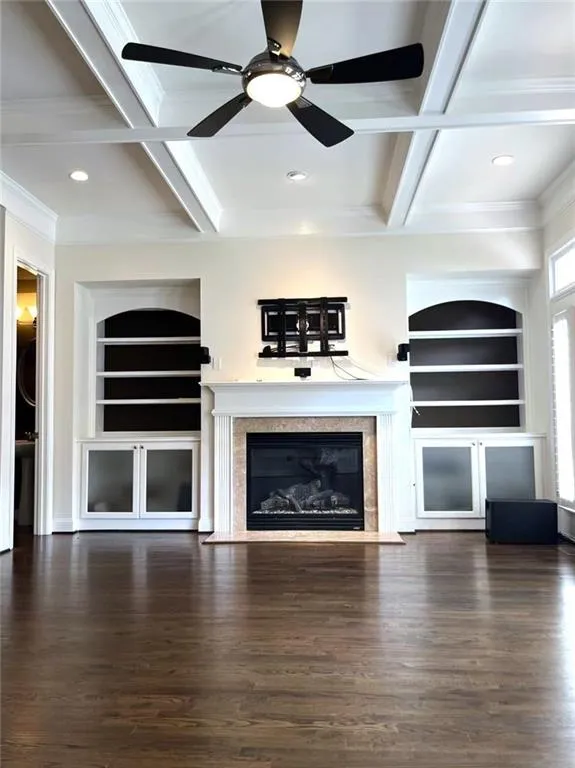 2nd level family room with hardwood floors   and coffered ceiling