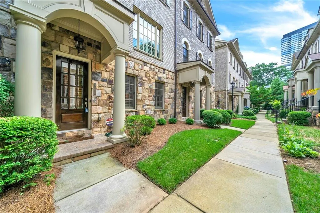 Property entrance with stone siding