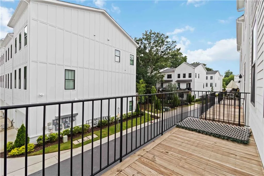 Wooden deck with a residential view