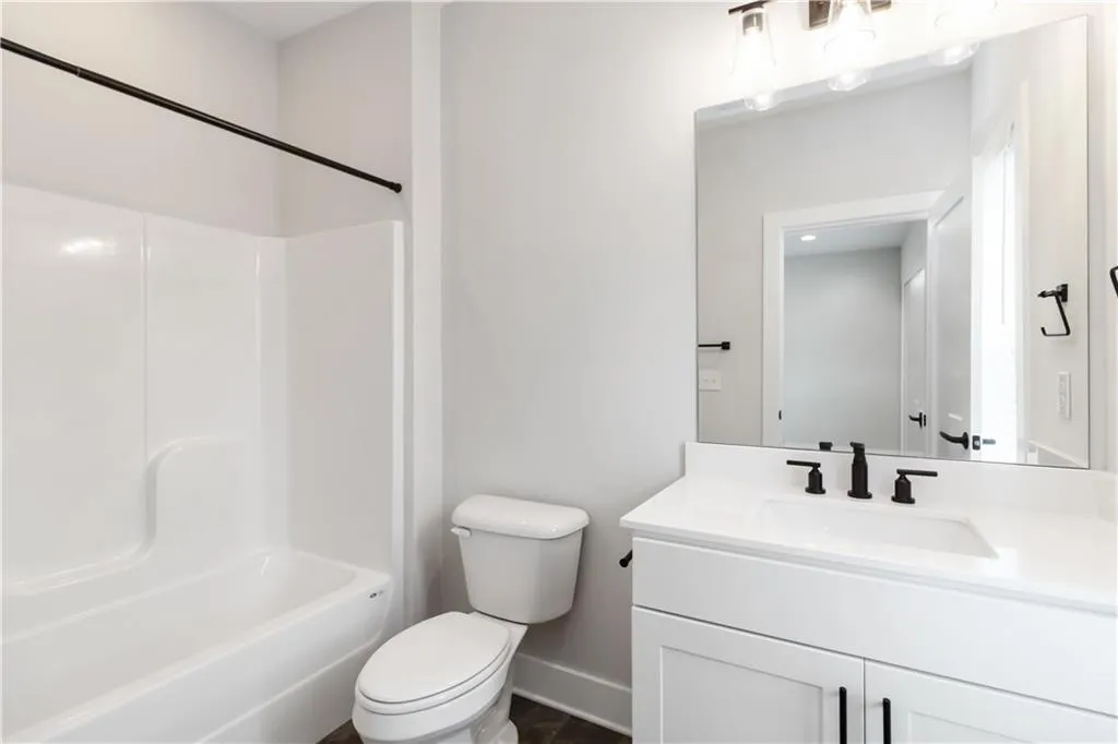 Full bathroom featuring vanity and shower / tub combination