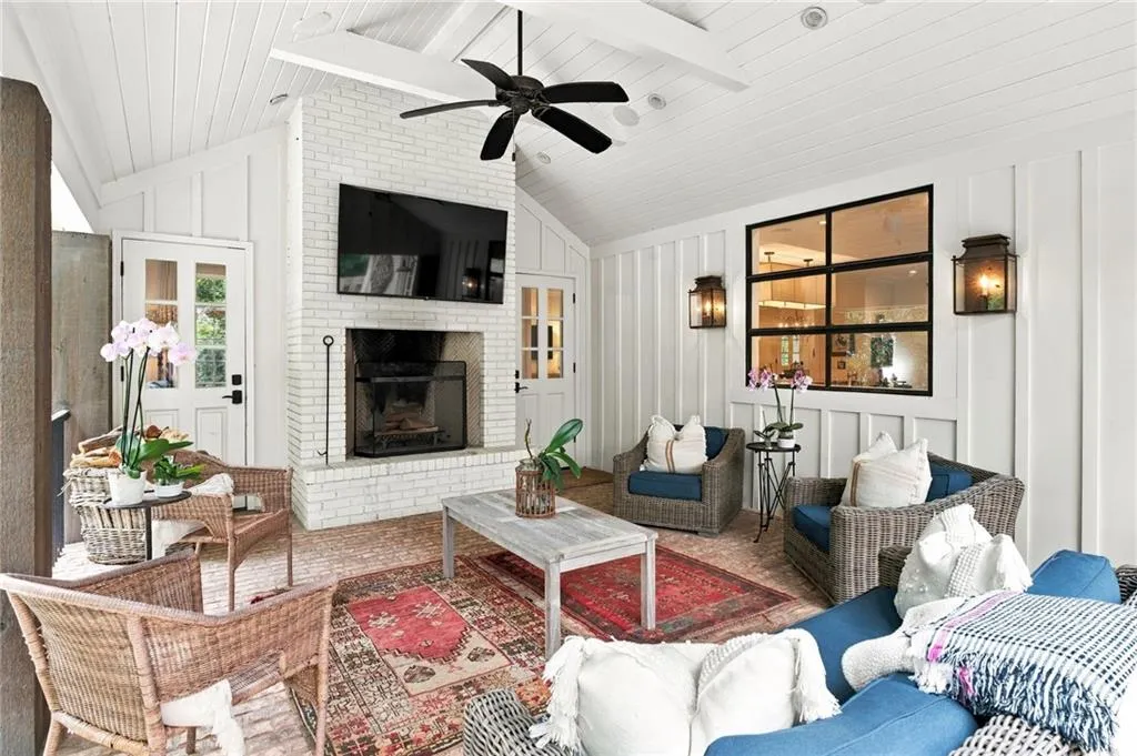 Covered porch with fireplace off living room and kitchen. Perfect flow for entertaining.