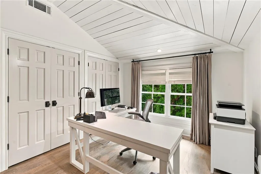 Bedroom 2 on upper level, currently used as an office