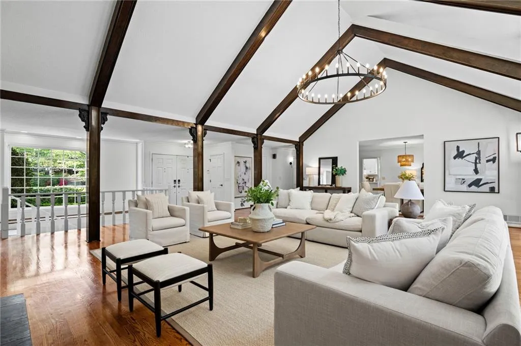 Open and airy with central stairs leading to lower level
