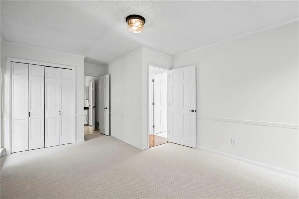 Bedroom #4 - Main Level.   New carpet, paint and lighting