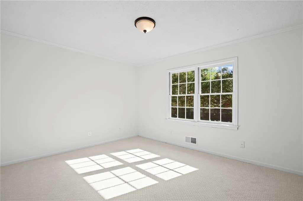Bedroom #2 - Main floor.   New carpet , paint and lighting