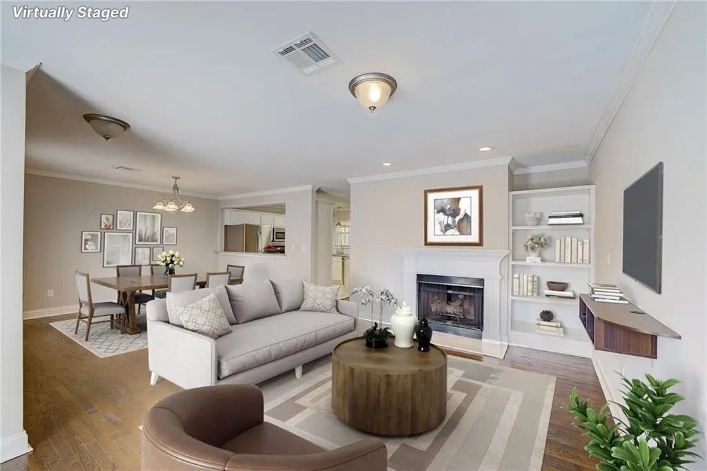 Living Room View, hardwood flooring, and crown molding