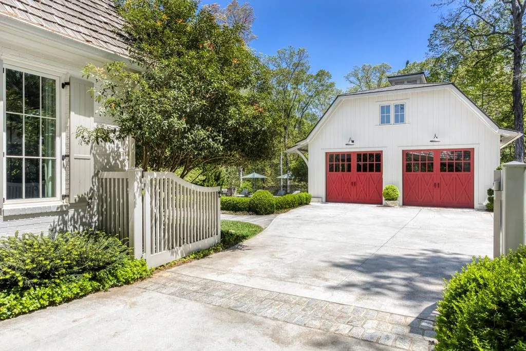 Privacy gate with oversized detached garage for 6 cars