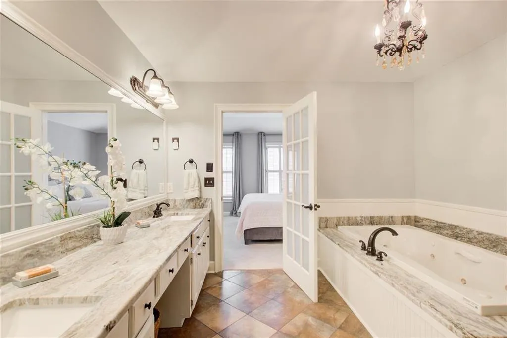 View from inside primary Bath looking into Bedroom