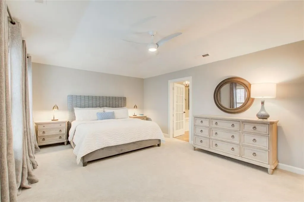 Oversize Primary Bedroom with plush carpeting
