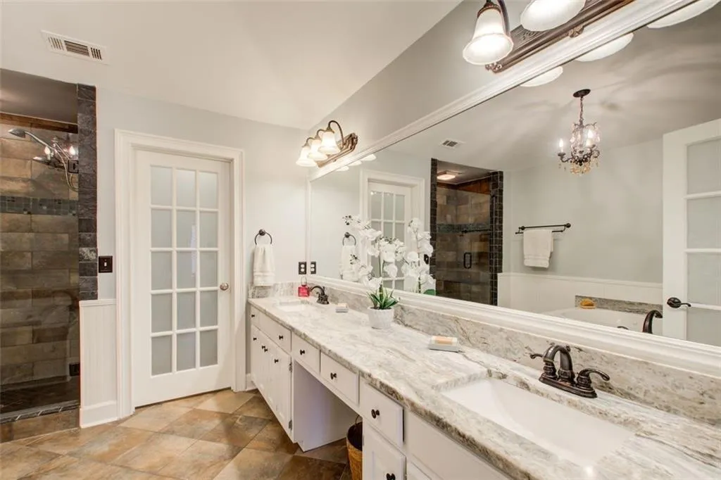 Primary Bath with Double Vanity with Granite countertops