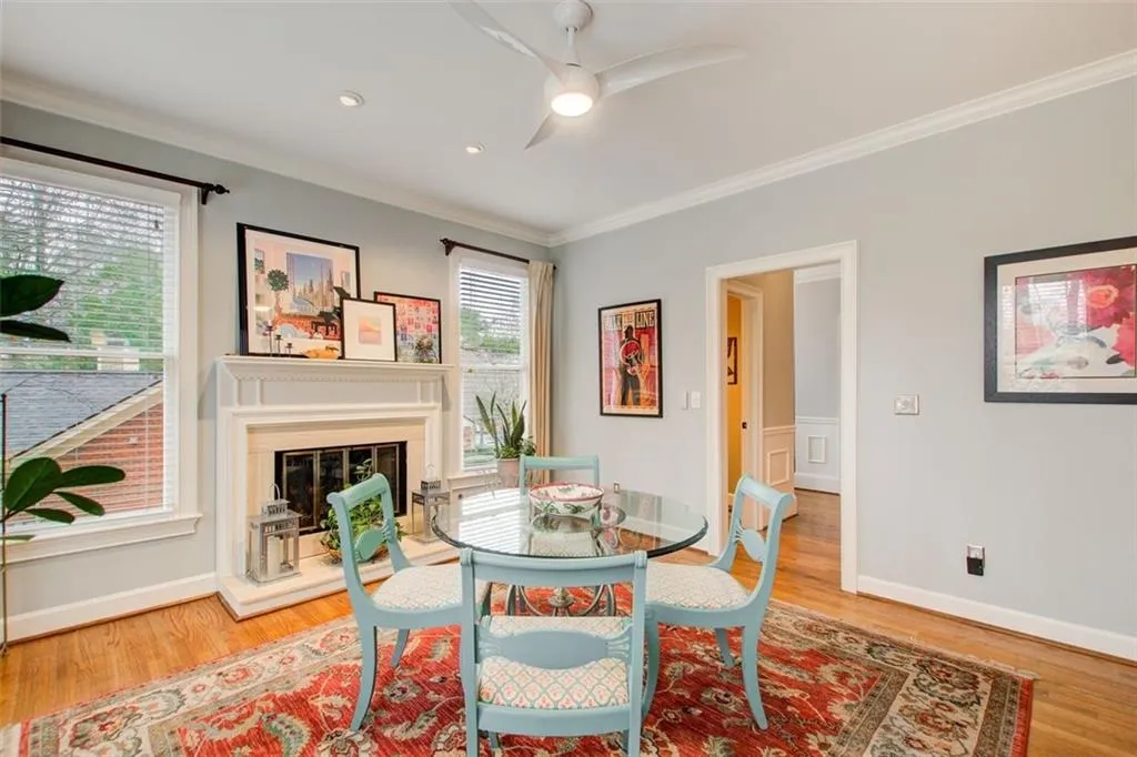 Cozy Keeping Room with Fireplace opens to the Backyard + Patio