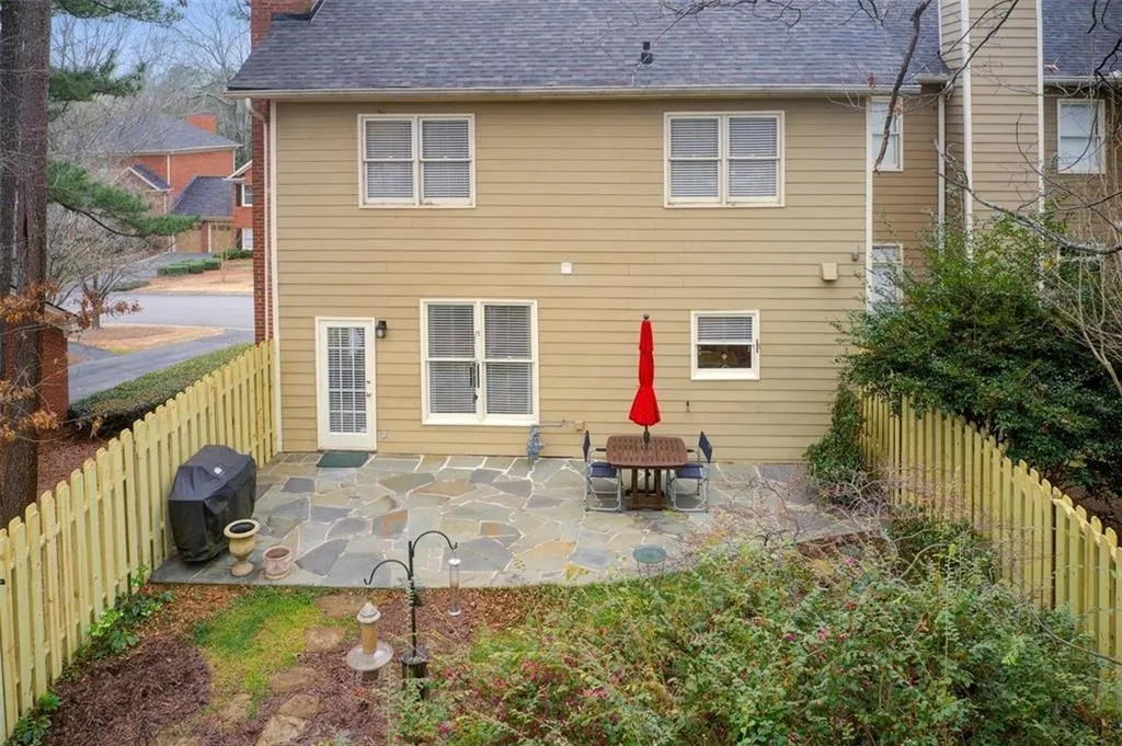 Large private backyard + patio with seasonal plantings