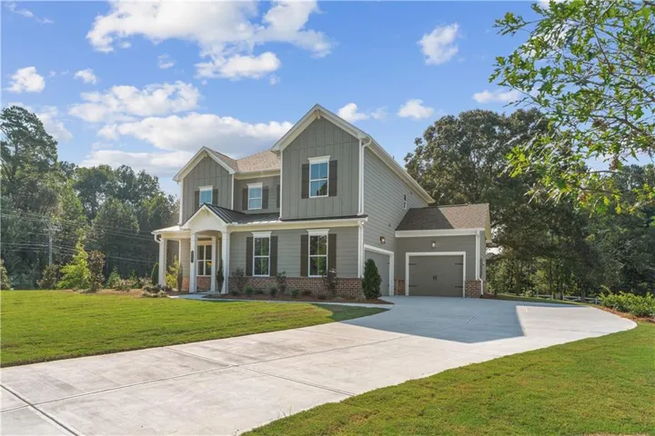 Dunning B 5/4 with a 3 car garage on a 3/4 acre lot.