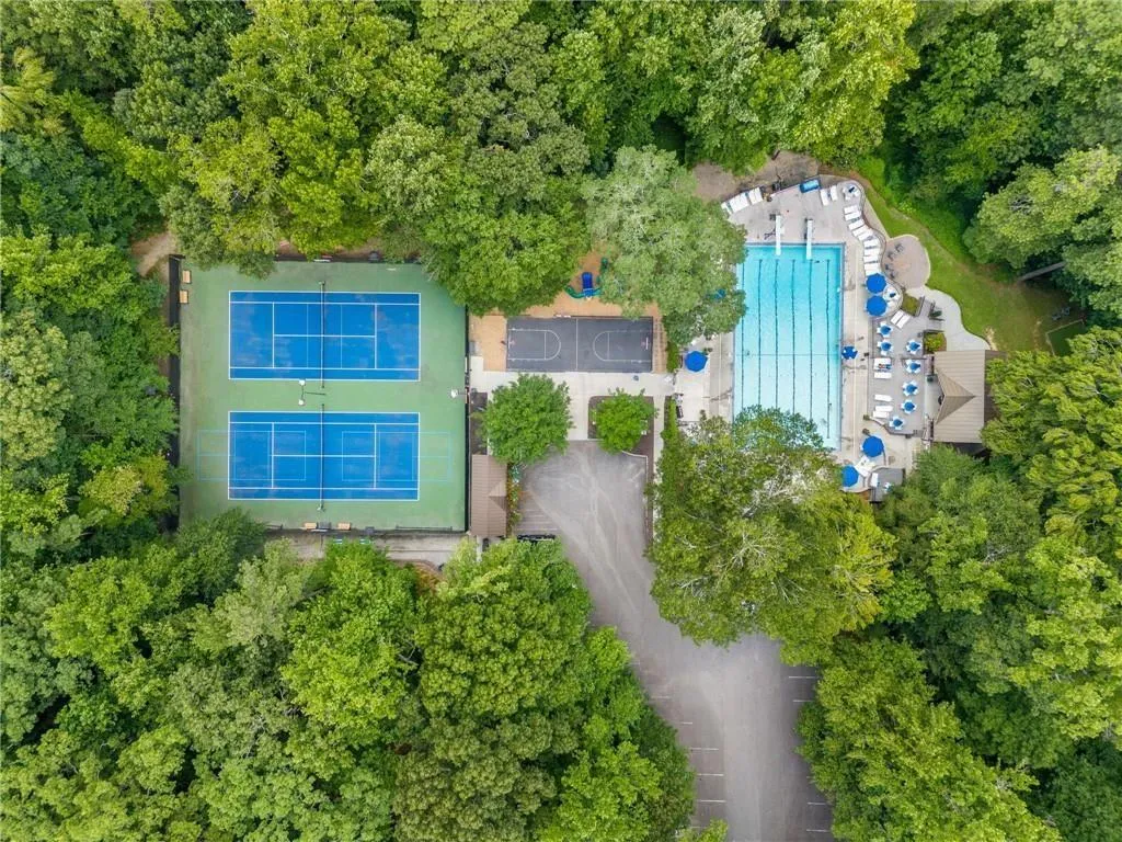 Owners are also eligible to join the Roxboro Valley Association Swim & Tennis Club which features a large, 25-meter heated pool with an extensive deck area furnished with chairs and lounges; a zero-entry baby pool; a picnic pavilion; a children’s playground; a “snack shack,” gas grills, and several dining tables; changing and shower facilities; and lighted tennis courts.